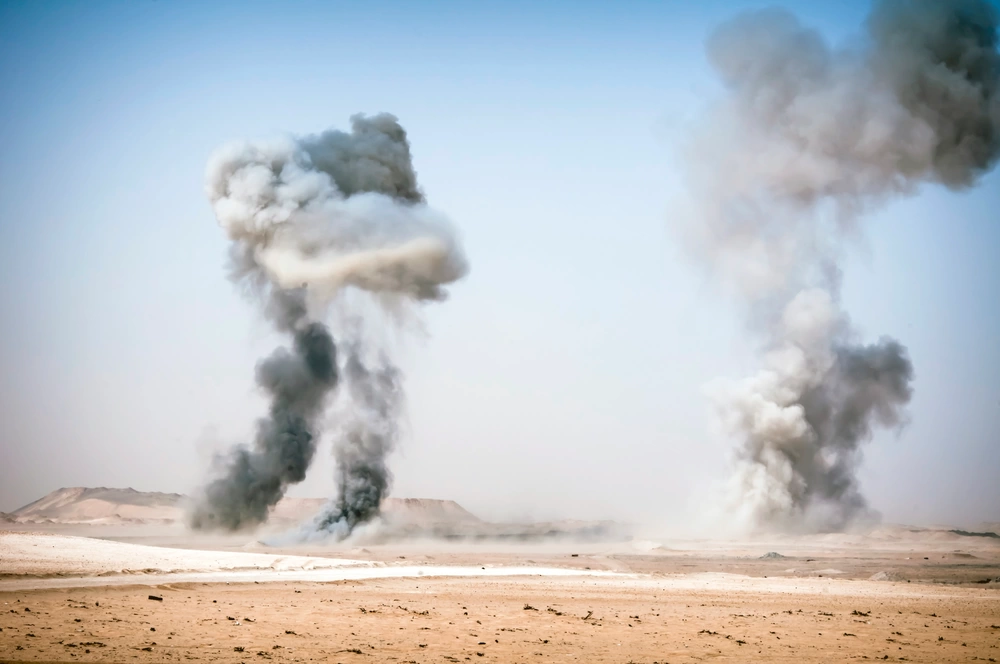Explosion as part of controlled detonation at firing range outside of Camp Buehring, Kuwait. Source. Sgt. Christopher Bigelow.