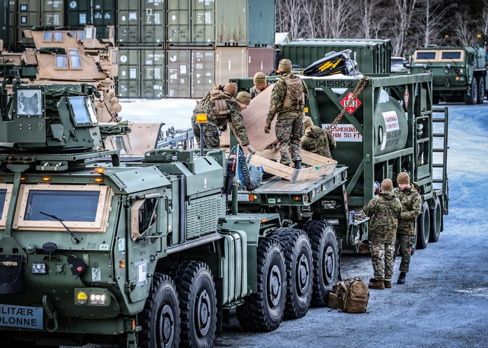 U.S. Marines prepare prepositioned motor transport equipment in Norway. Preparation supports safe, coordinated movement and timely employment of equipment issued to II Marine Expeditionary Force Marines. Source. USMC photo by Cpl. Nicholas Martinez.