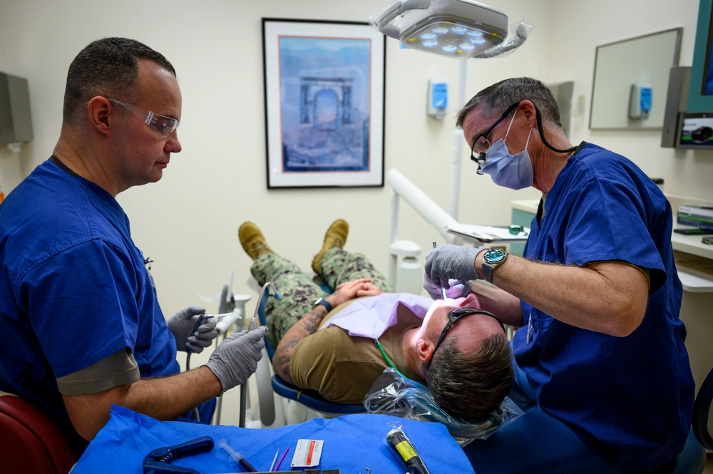 Dentistry at U.S. Navy Sailor assigned to U.S. Naval Support Activity Naples. Source. USAF Tech Sgt. Alexander Rector.